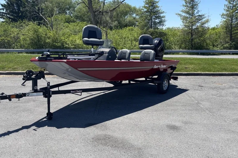The Image of 2026 Tracker Bass Tracker Classic XL boat on trailer, parked outdoors. - 0