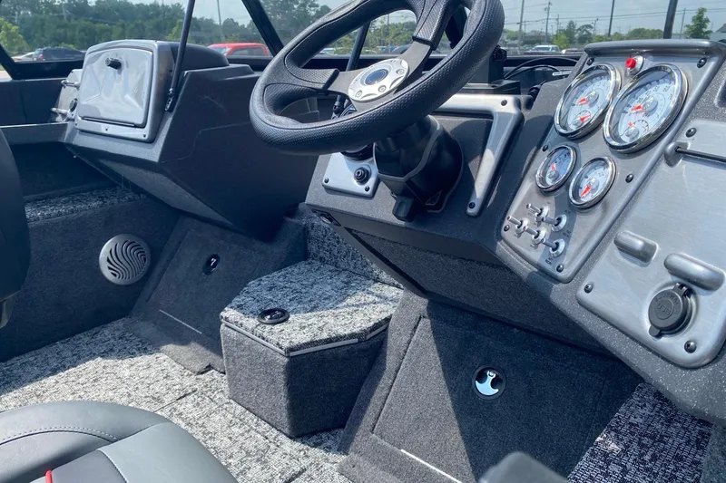Slide: The Image of Interior view of 2026 Tracker Pro Guide V-175 Combo boat dashboard and controls. - 5