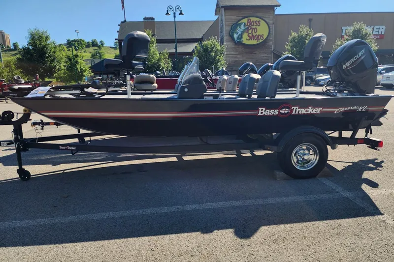 The Image of 2026 Tracker Bass Tracker Classic XL boat displayed outside Bass Pro Shops. - 0