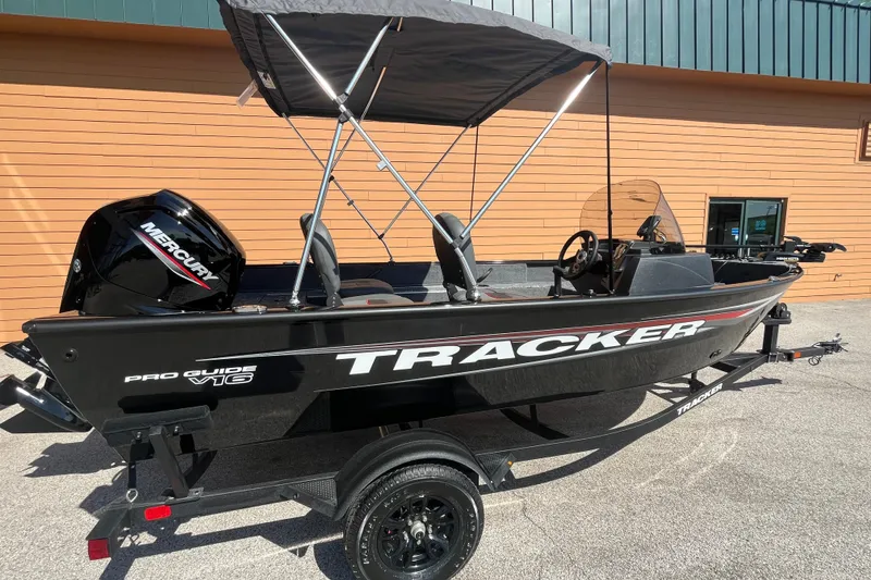 The Image of 2026 Tracker Pro Guide V-16 SC boat with Mercury engine on trailer. - 0