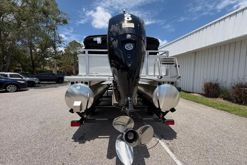 Slide: The Image of 2026 Sun Tracker Party Barge 22 RF DLX pontoon boat with powerful outboard motor. - 5