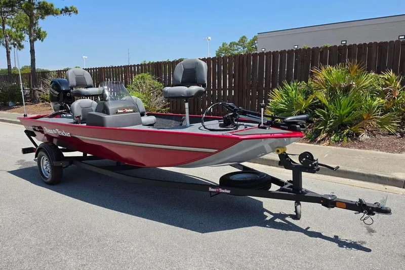 Slide: The Image of 2026 Tracker Bass Tracker Classic XL boat on trailer, parked outdoors. - 5