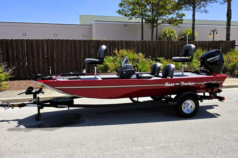Slide: The Image of 2026 Tracker Bass Tracker Classic XL boat on trailer, parked outdoors. - 8