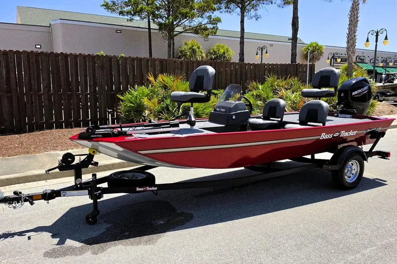 Slide: The Image of 2026 Tracker Bass Tracker Classic XL boat on trailer, parked outdoors. - 9