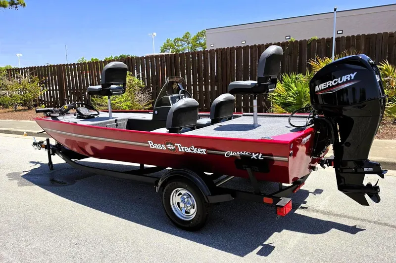 Slide: The Image of 2026 Tracker Bass Tracker Classic XL boat with Mercury engine on trailer. - 11