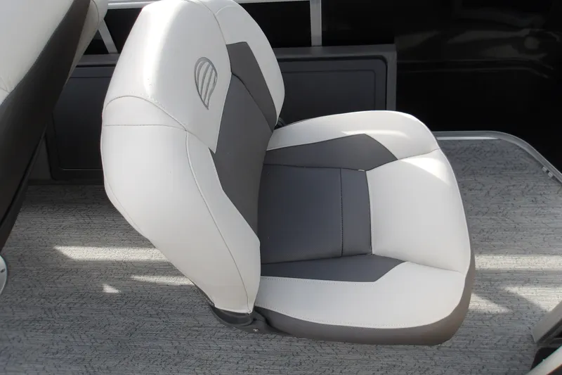 Slide: The Image of 2026 Sun Tracker Fishin' Barge 22 DLX boat seat, featuring gray and white upholstery. - 15