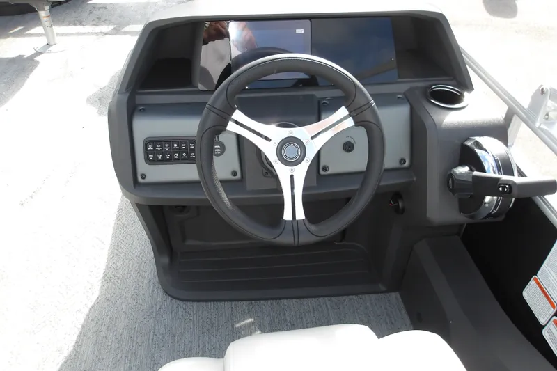 Slide: The Image of Steering console of 2026 Sun Tracker Fishin' Barge 22 DLX pontoon boat. - 17
