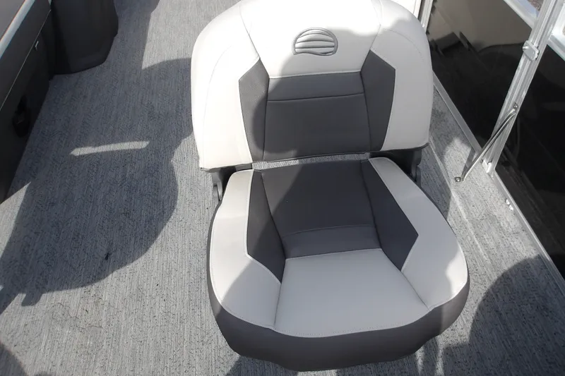 Slide: The Image of Gray and white seat on 2026 Sun Tracker Fishin' Barge 22 DLX boat. - 22