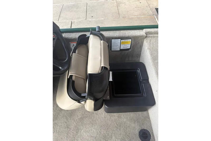 Slide: The Image of 2026 Tracker Bass Tracker Classic Limited boat seat with storage compartment. - 13