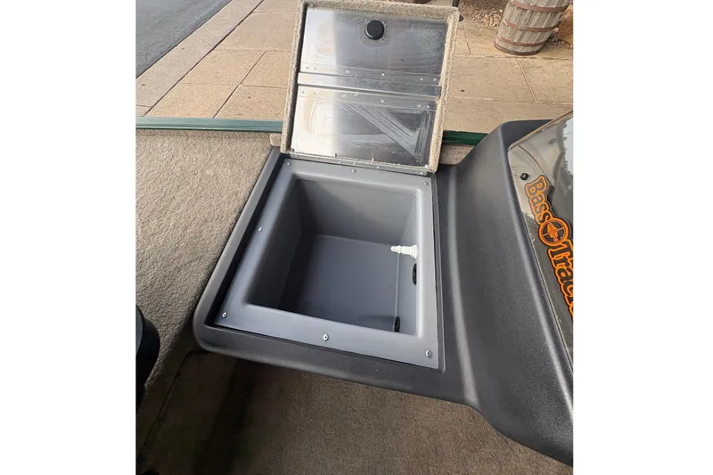 Slide: The Image of An open storage compartment on a 2026 Tracker Bass Tracker Classic Limited boat. - 11