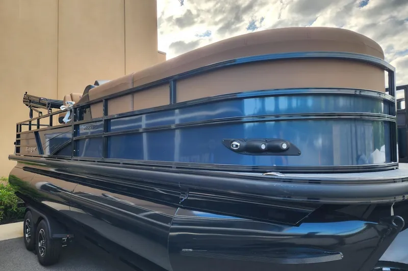 Slide: The Image of 2026 Ranger 223FC pontoon boat with sleek design and modern features. - 1