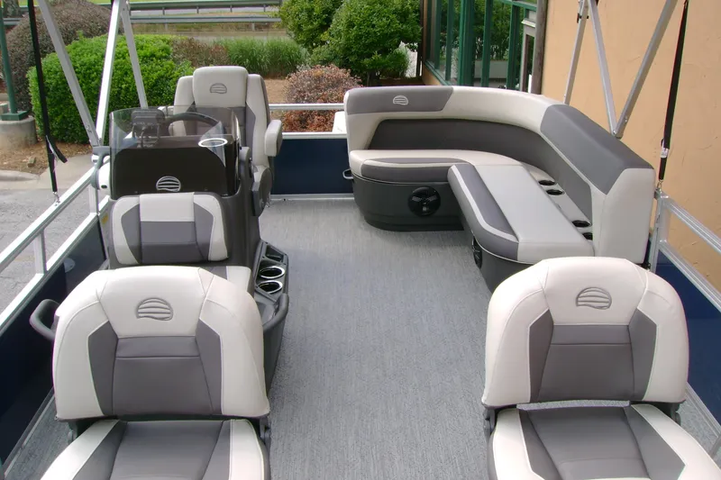 Slide: The Image of 2026 Sun Tracker Bass Buggy 16 XL Select pontoon boat interior with gray seating. - 5