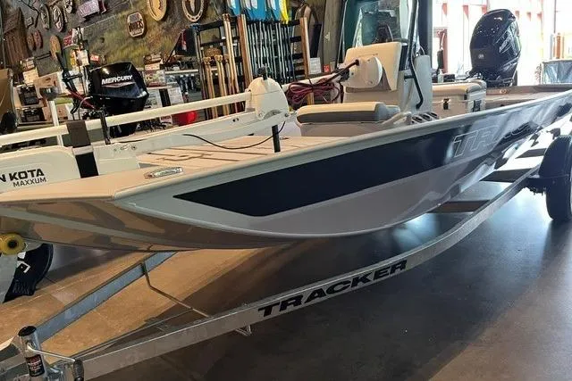 The Image of 2026 Tracker Bass Tracker Classic CC boat on display in a showroom. - 0