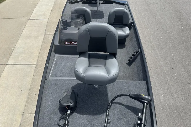 Slide: The Image of 2026 Tracker Bass Tracker Classic XL boat with gray seating and trolling motor. - 7