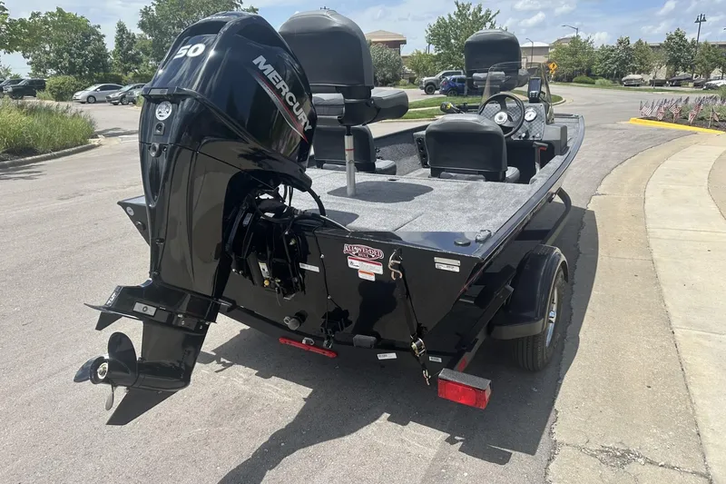 Slide: The Image of 2026 Tracker Bass Tracker Classic XL boat with Mercury engine on a trailer. - 4