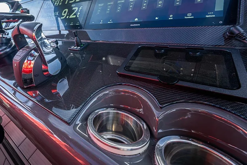 Slide: The Image of Dashboard of 2021 Midnight Express 43 Solstice with modern controls and touchscreen display. - 19
