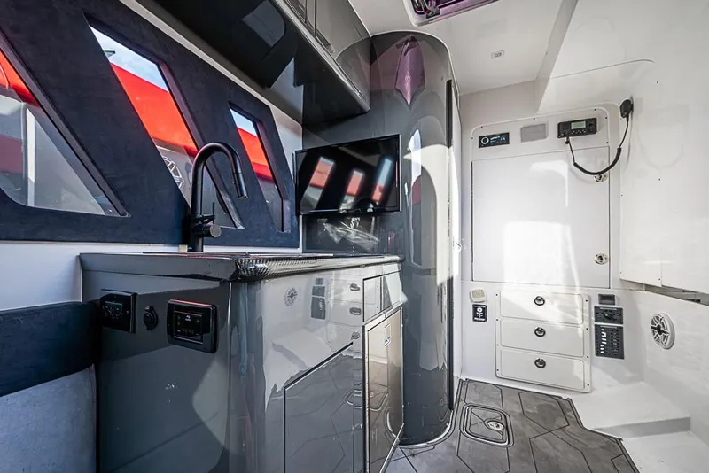 Slide: The Image of Luxurious interior of 2021 Midnight Express 43 Solstice boat with modern amenities. - 39