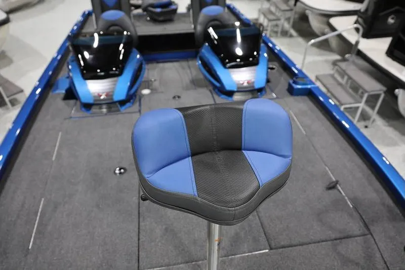 Slide: The Image of 2026 Vexus AVX 2085S boat interior with blue and black seating. - 15