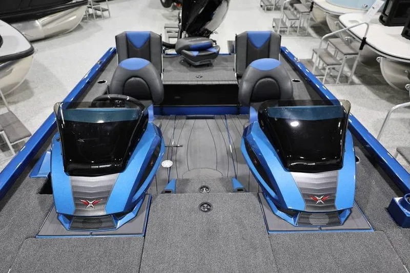 Slide: The Image of 2026 Vexus AVX 2085S boat interior with dual consoles and blue accents. - 16