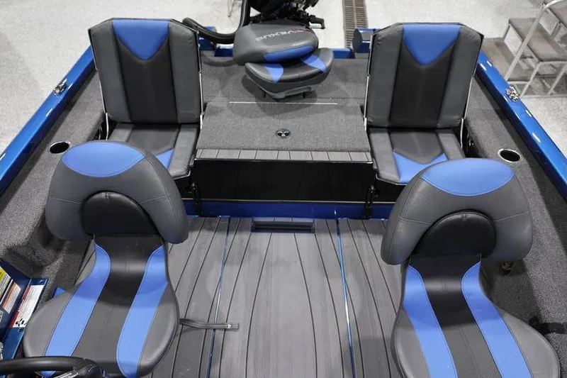 Slide: The Image of 2026 Vexus AVX 2085S boat interior with blue and black seating arrangement. - 19