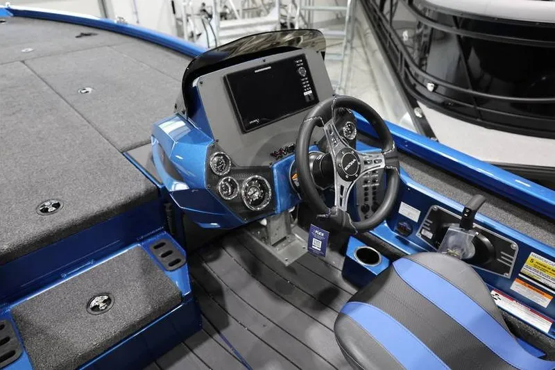 Slide: The Image of 2026 Vexus AVX 2085S boat interior with steering wheel and dashboard controls. - 22
