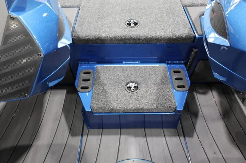 Slide: The Image of 2026 Vexus AVX 2085S boat interior with blue and gray seating and storage compartments. - 24