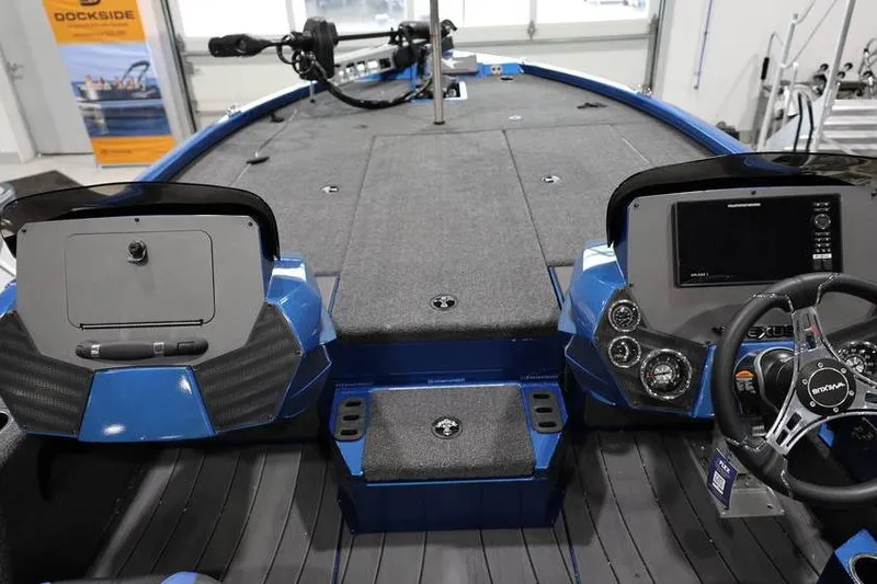 Slide: The Image of 2026 Vexus AVX 2085S boat interior with dual consoles and advanced navigation system. - 25