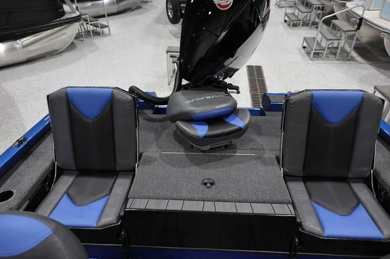 Slide: The Image of 2026 Vexus AVX 2085S boat interior with blue and black seating. - 26