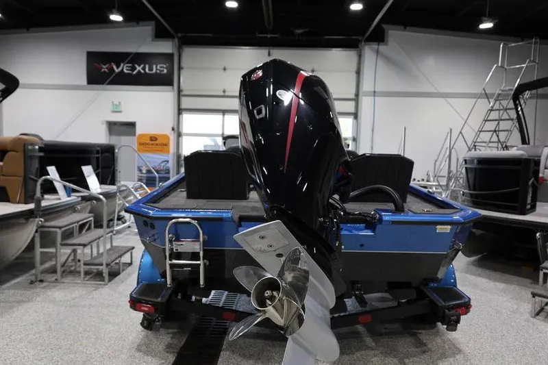 Slide: The Image of 2026 Vexus AVX 2085S boat with powerful outboard motor in showroom. - 3