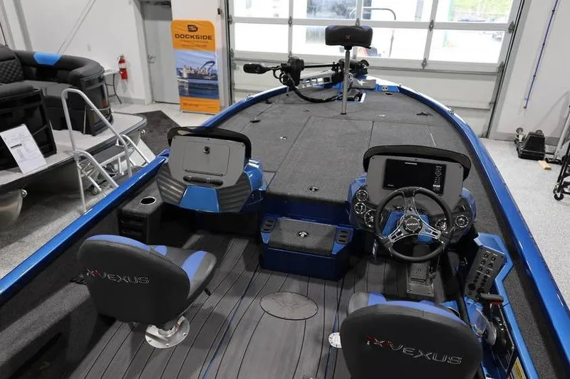 Slide: The Image of 2026 Vexus AVX 2085S boat interior with modern controls and seating. - 30