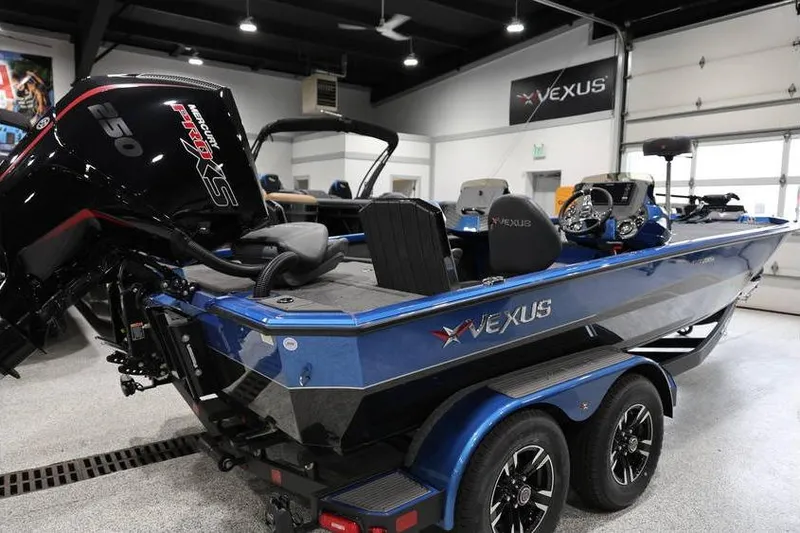 Slide: The Image of 2026 Vexus AVX 2085S boat with Mercury 250 engine in showroom. - 4