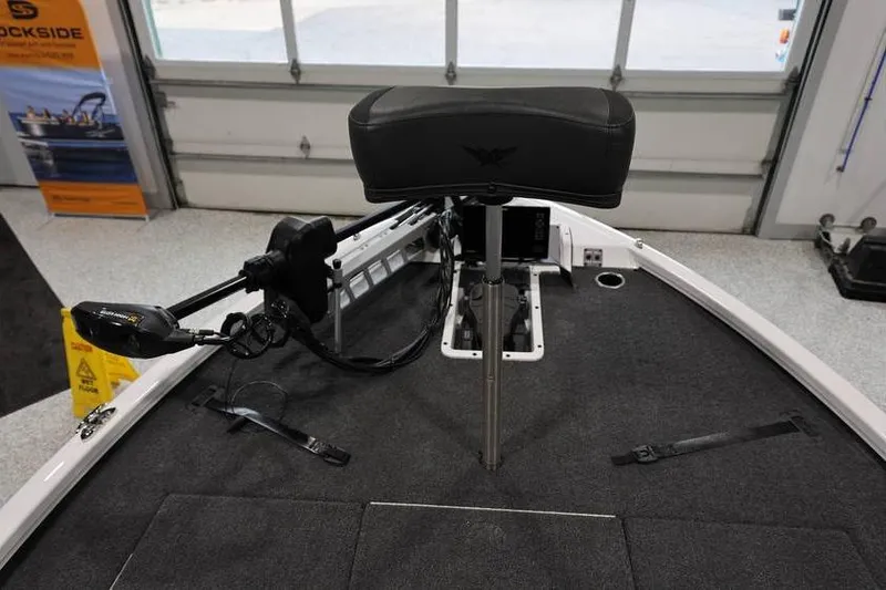 Slide: The Image of 2026 Vexus AVX 2100 boat interior with trolling motor and cushioned seat. - 10
