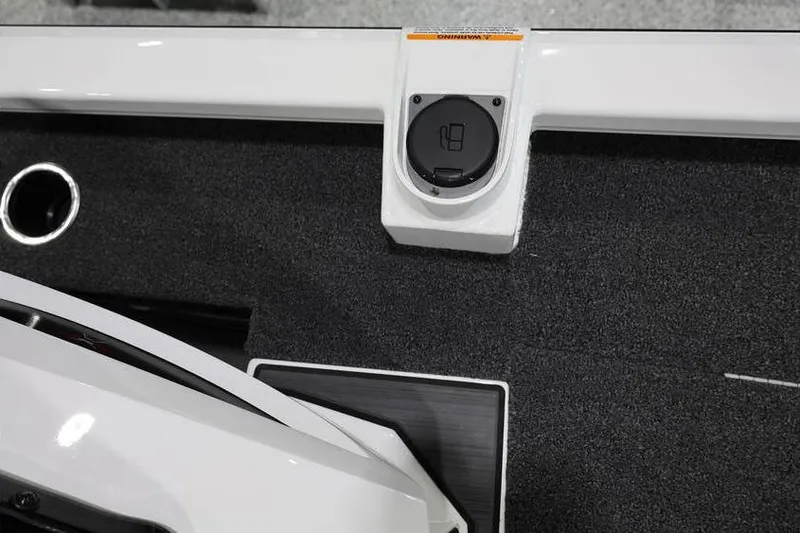 Slide: The Image of 2026 Vexus AVX 2100 boat deck with fuel cap and sleek design. - 11
