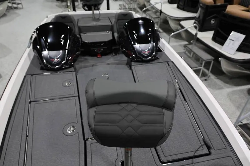Slide: The Image of 2026 Vexus VXs21 boat interior with dual engines and seating. - 16