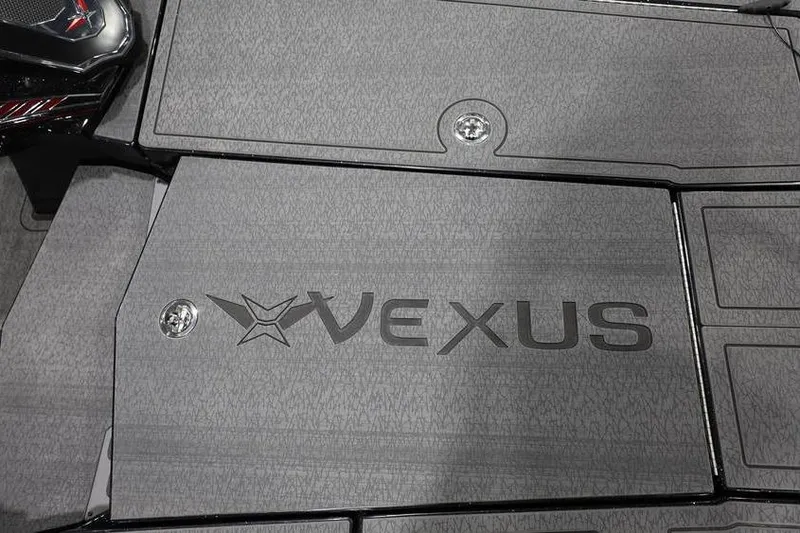 Slide: The Image of 2026 Vexus VXs21 boat deck with logo and textured surface. - 17