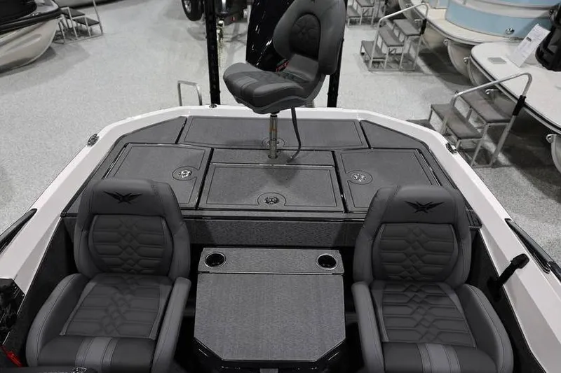 Slide: The Image of 2026 Vexus VXs21 boat interior with seating and storage compartments. - 21
