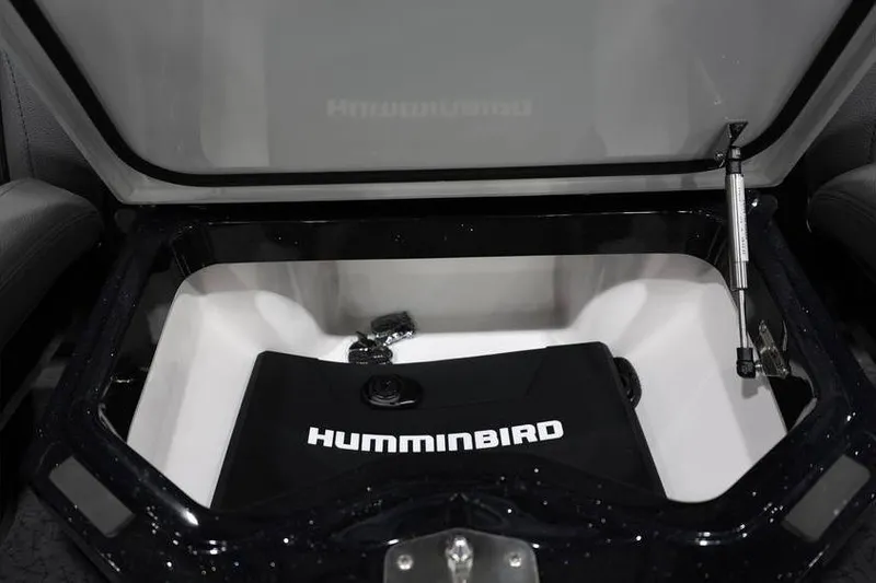Slide: The Image of Open storage compartment in 2026 Vexus VXs21 boat with Humminbird equipment. - 25