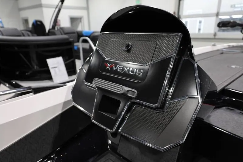 Slide: The Image of 2026 Vexus VXs21 boat dashboard with sleek black design and logo. - 27