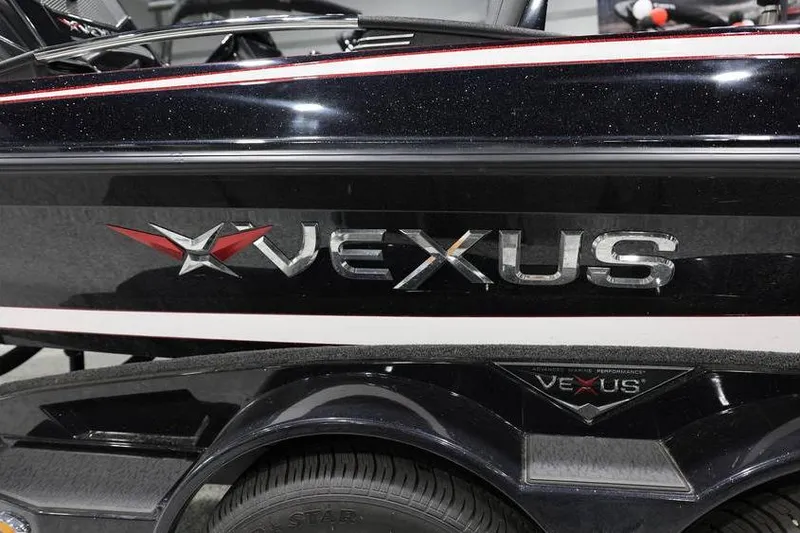 Slide: The Image of 2026 Vexus VXs21 boat logo on sleek black exterior. - 3