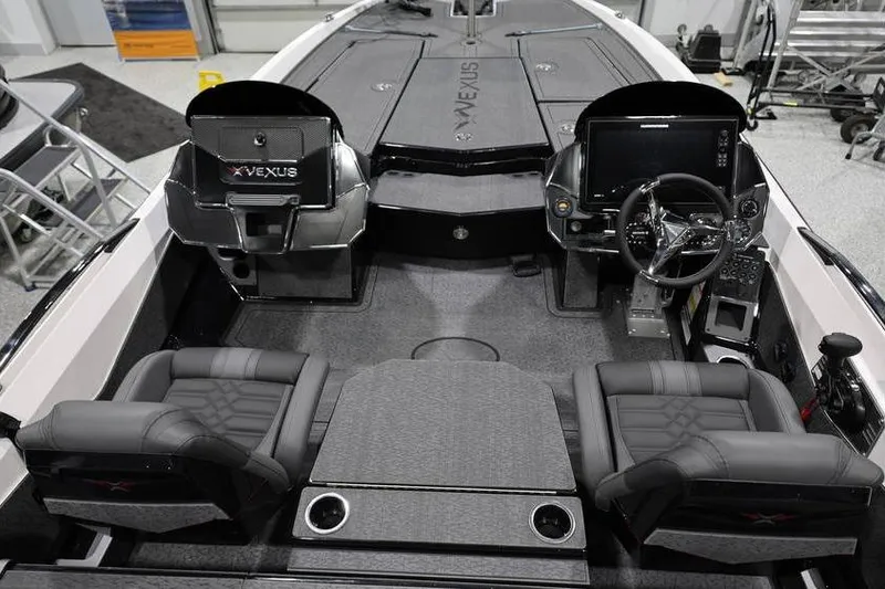 Slide: The Image of 2026 Vexus VXs21 boat interior with dual consoles and modern seating. - 30