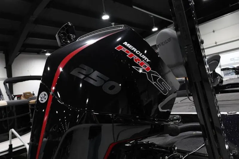 Slide: The Image of 2026 Vexus VXs21 boat with Mercury Pro XS 250 engine in showroom. - 6
