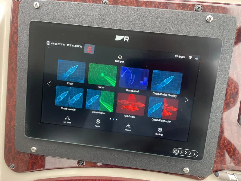 Slide: The Image of Navigation display on 2008 Sea Ray 310 Sundancer boat showing chart and radar options. - 10
