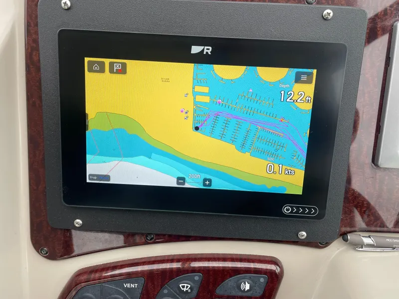 Slide: The Image of Navigation display on 2008 Sea Ray 310 Sundancer showing depth and speed. - 11