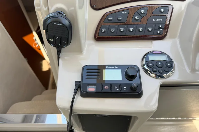 Slide: The Image of Control panel of a 2008 Sea Ray Sundancer 310 with Raymarine equipment. - 14