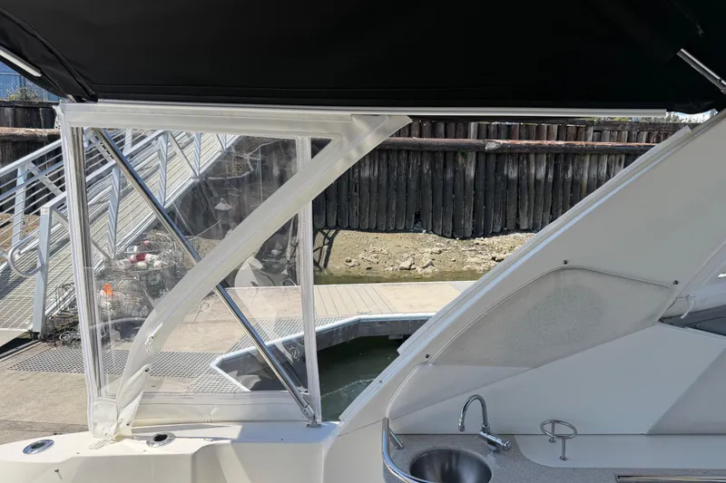 Slide: The Image of 2008 Sea Ray Sundancer 310 boat interior with sink, dockside view. - 51