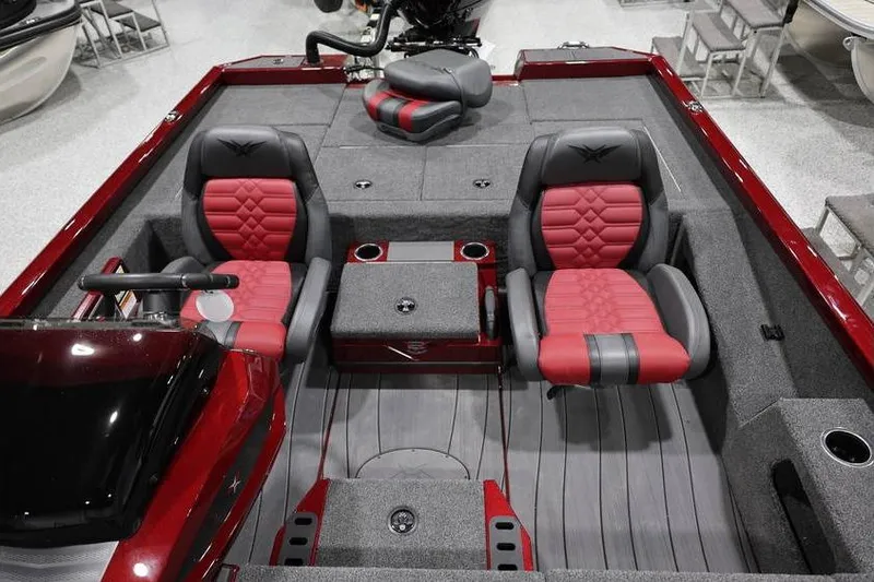 Slide: The Image of 2026 Vexus AVX 2100 boat interior with red and gray seating and storage compartments. - 13