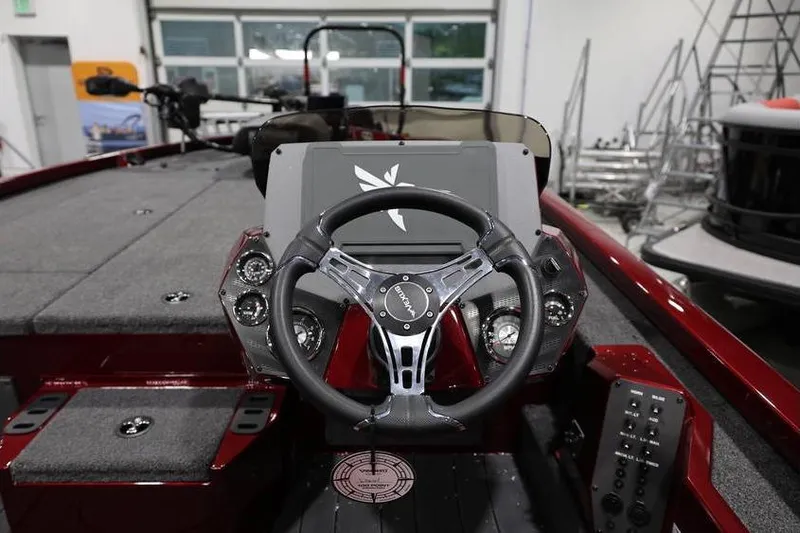 Slide: The Image of 2026 Vexus AVX 2100 boat interior with steering wheel and dashboard controls. - 17