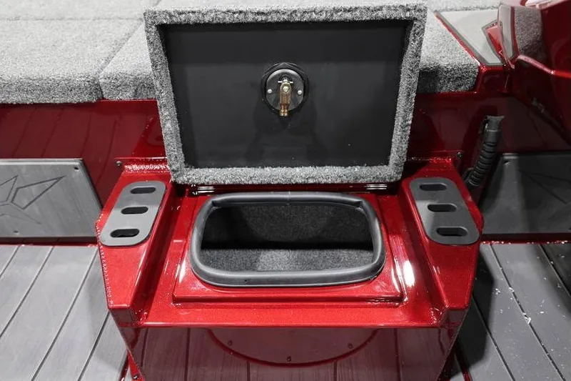 Slide: The Image of 2026 Vexus AVX 2100 boat storage compartment with open lid, red finish. - 23