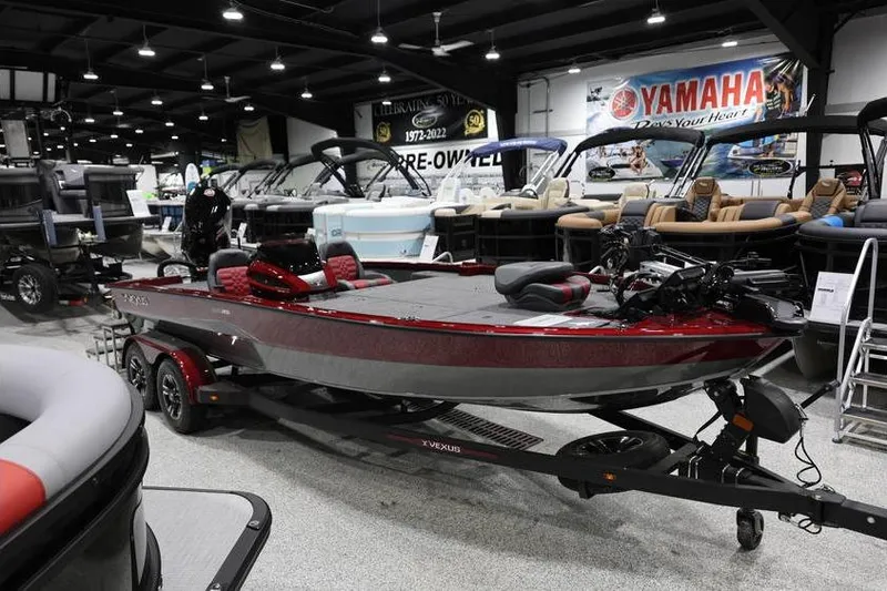 Slide: The Image of 2026 Vexus AVX 2100 boat displayed in a showroom with Yamaha signage. - 5
