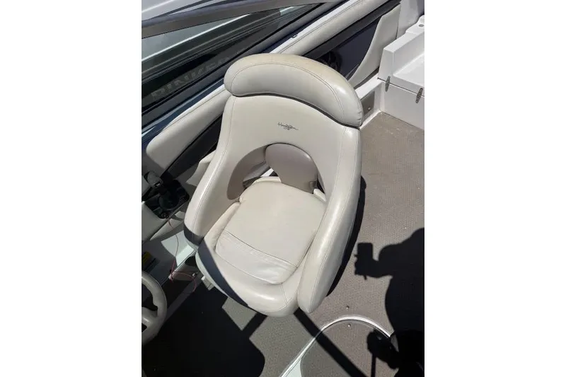 Slide: The Image of Cream leather seat in 2002 Four Winns 220 Horizon boat interior. - 10